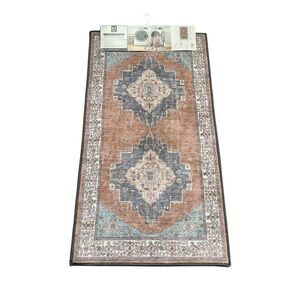 Member’s‎ Mark Everwash washable Rug in orange, blue and grey.